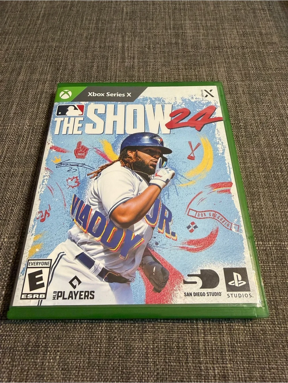 Microsoft Xbox Series X Game with Green Case and Blue Cover Art